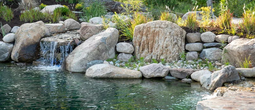 natural-pond-hero Natural rock waterfall garden pond